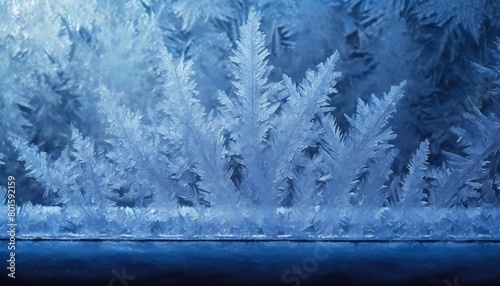 frosty patterns on the edge of a frozen window