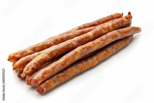 Pile of Sausage Sticks on White Background