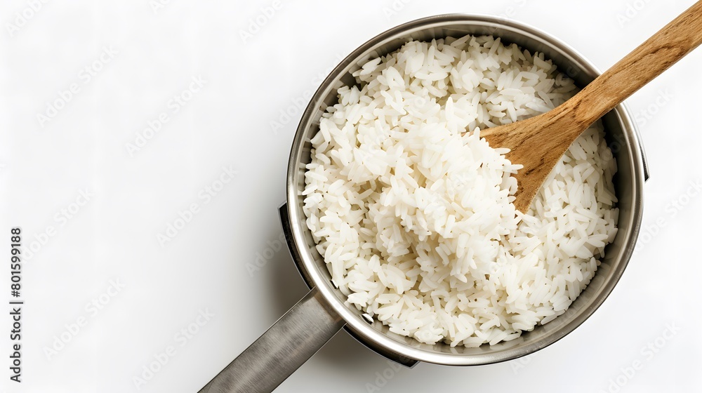 Top view shot capturing rice in a pan. Top view shot capturing rice in a pan.