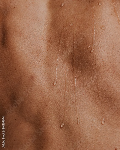 Closeup back, wet human skin texture photo photo