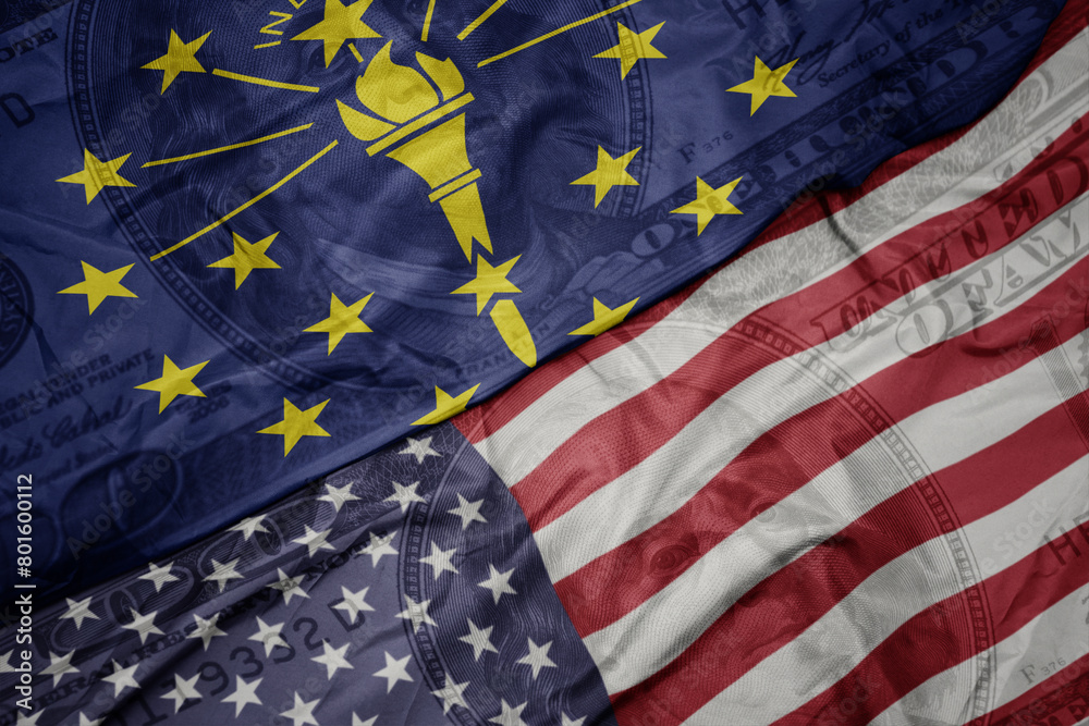 Obraz premium waving colorful flag of united states of america and flag of indiana state on the dollar money background. finance concept.
