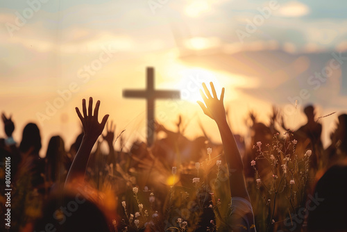 Group of People Holding Up Hands in Front of a Cross