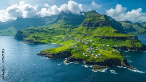 Stunning aerial shot captures the vibrant greenery and scattered houses of Kirkjubour, Faroe Islands, under clear blue skies, surrounded by the vast ocean.
