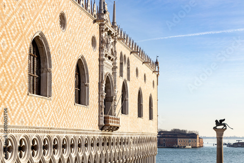 View of Doge's Palace and Columns of San Marco with the statue of the Winged Lion of Venice, Italy photo