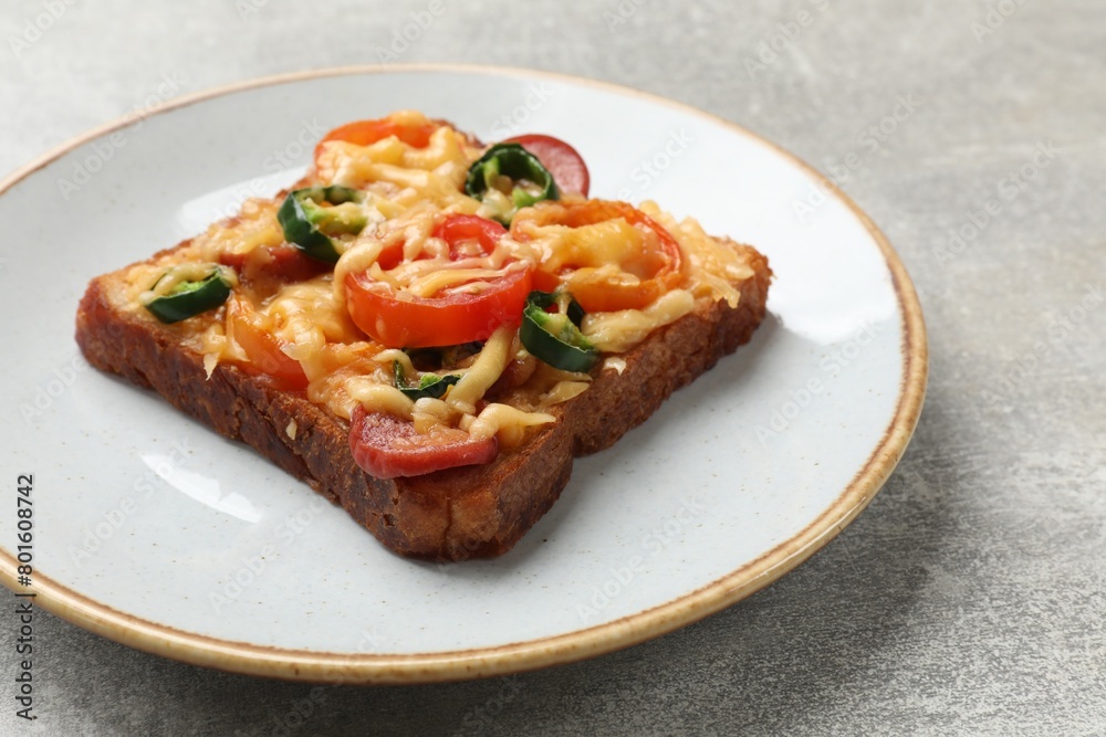 Tasty pizza toast on grey table, closeup