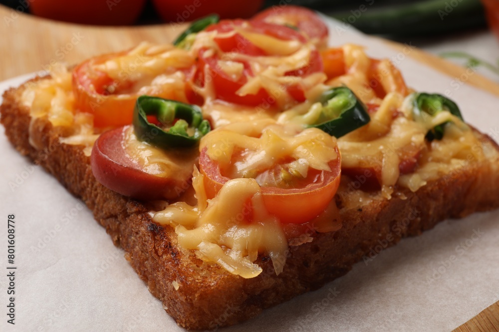 Tasty pizza toast on table, closeup view Tasty pizza toast on table, closeup view