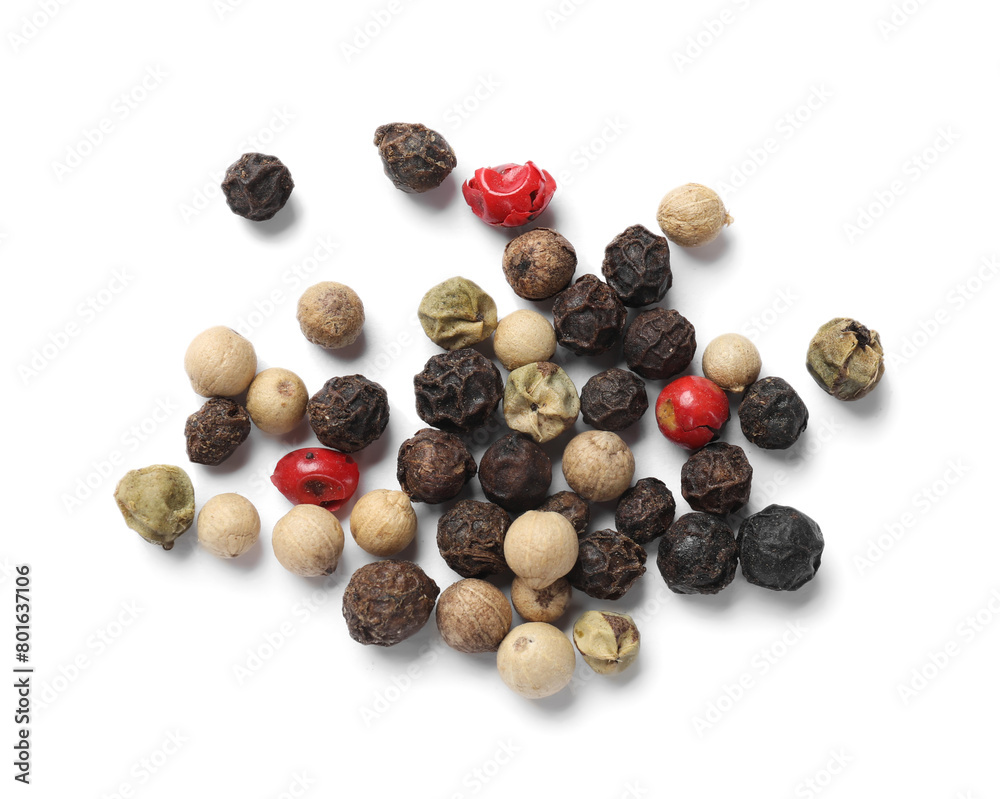 Aromatic spices. Pile of different peppers isolated on white, top view