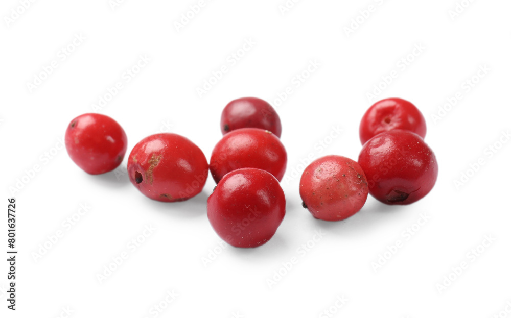 Aromatic spice. Many red peppercorns isolated on white Aromatic spice. Many red peppercorns isolated on white