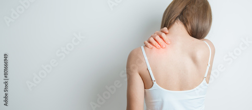 Woman having Shoulder and Neck pain at home. Muscle painful due to Myofascial pain syndrome and Fibromyalgia, rheumatism, Scapular pain, Cervical Spine. ergonomic concept