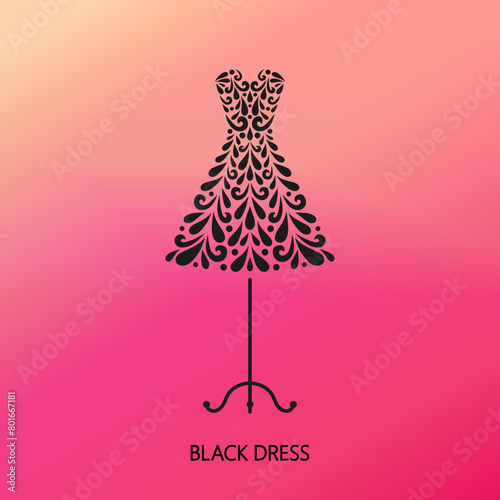 Small black dress on the hanger. Floral mosaic style. Fashion concept.