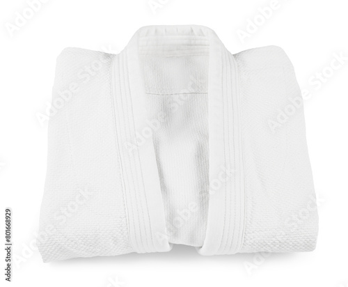 Folded kimono isolated on white. Martial arts uniform photo