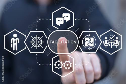 Facilitator working on virtual touch screen presses word: FACILITATION. Concept of facilitation. Business and finance facilitating. © wladimir1804