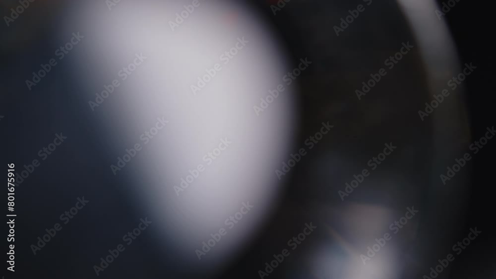 Multicolored light leaks 4k footage on black background. Lens studio flare leak burst overlays. Natural lighting lamp rays bokeh effect. For compositing over your footage, stylizing video, transitions