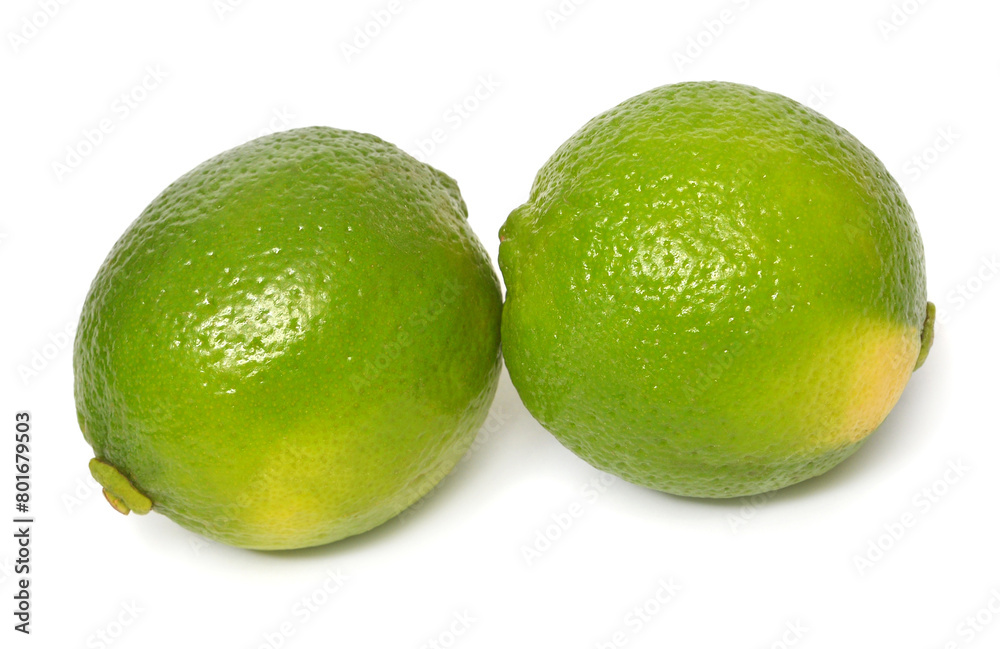 Two lime fruit whole isolated on white background Two lime fruit whole isolated on white background