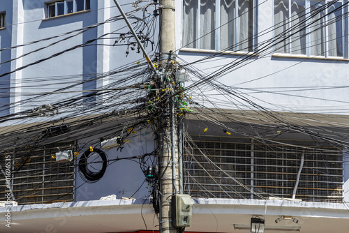 Tangled electrical wiring on a street pole in Juiz de Fora, state of Minas Gerais, Brazil
