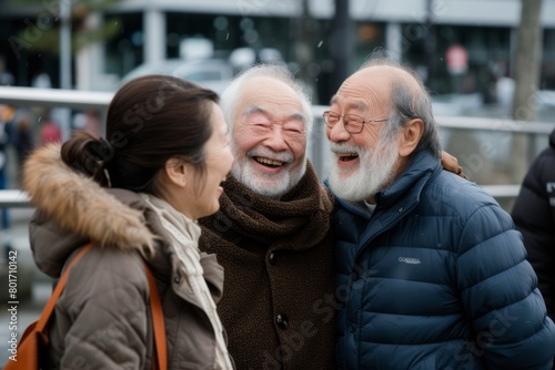 Happy elderly couple walking in the city. They are laughing and smiling.