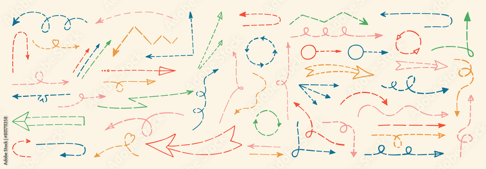 Obraz premium Dashed arrows hand drawn doodle set. Dotted pointers collection ideal for adding playful touch to presentations, designs kid projects, infographics and statistics. Arrows sign child isolated vector