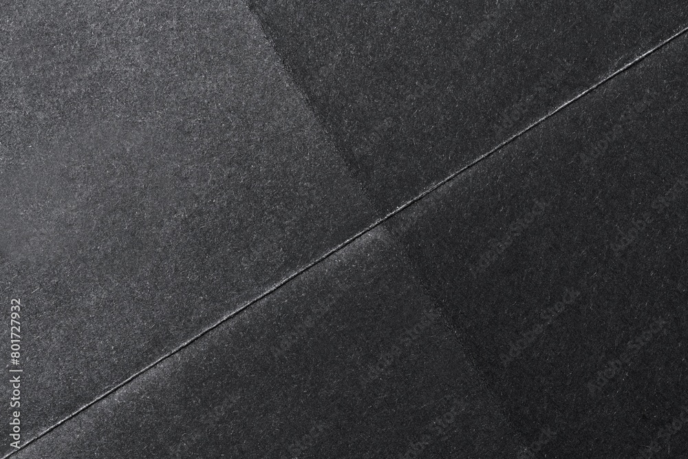Fototapeta premium Folded black paper texture background