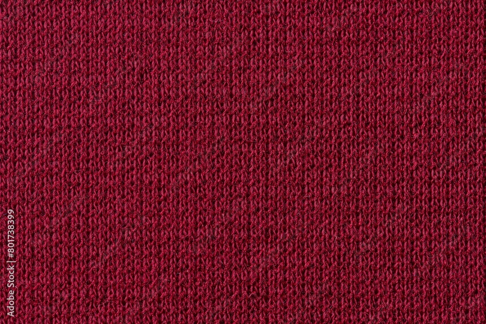 Fototapeta premium Red background, knitted fabric texture, macro shot design
