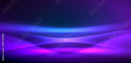 An electric blue and magenta glowing wave on a dark background creates a mesmerizing visual effect lighting up the darkness with vibrant colorfulness