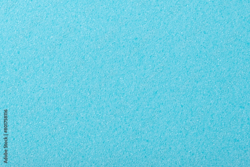 Blue background, rough sponge texture, macro shot design
