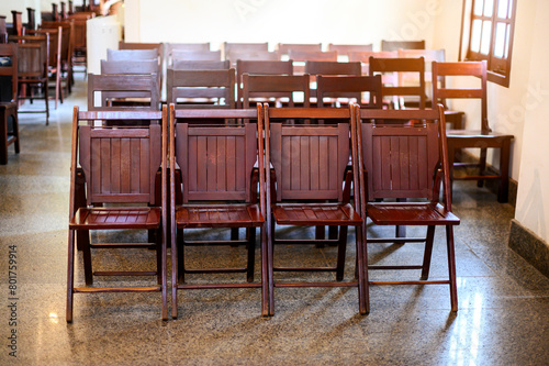 wooden bench and chair in christian church hall