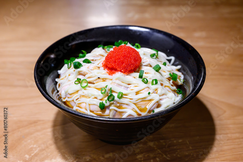Japanese beef rice bowl or Gyudon topped with Onsen egg isolated on white background
