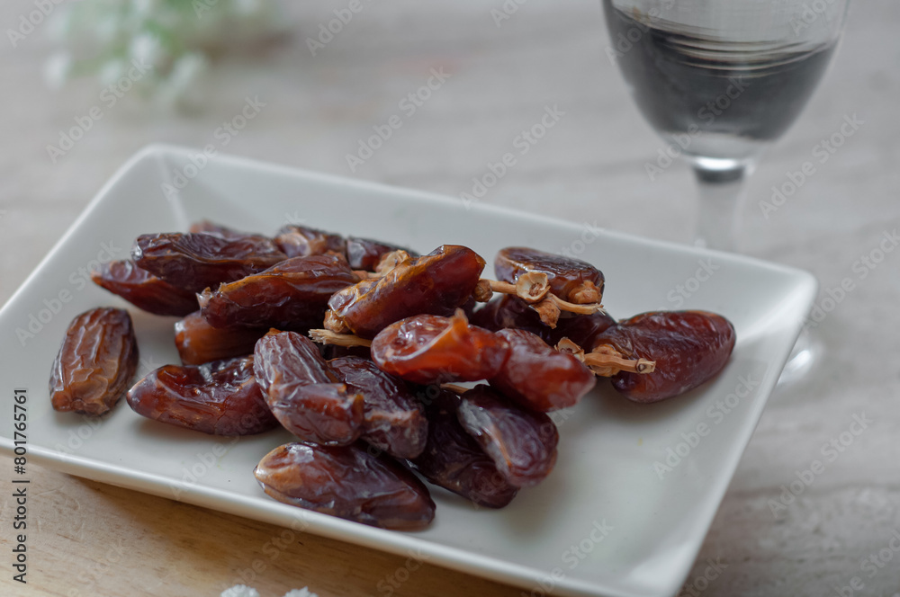 Dates and pure drinking water is consume to end Ramadan fast. Breaking Ramadan fast at Iftar. Dates and pure drinking water is consume to end Ramadan fast. Breaking Ramadan fast at Iftar.
