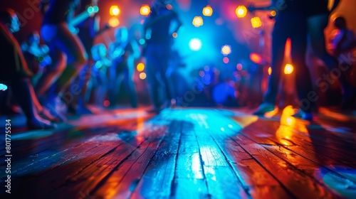 A funky dance floor packed with people grooving to the beats of a live band at a music venue that offers an impressive selection of alcoholfree options. photo