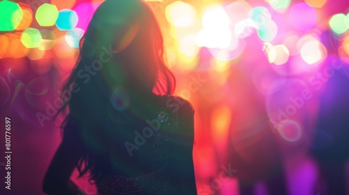 Back view of a woman with party vibes surrounded by colorful bokeh lights at night.