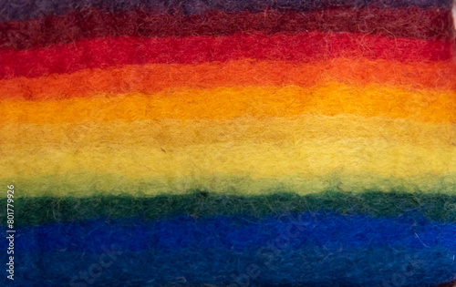The velvet fabric is colored in a variety of rainbow tones, a symbol of sexual pluralism.