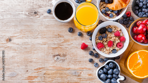 Healty breakfast with muesli, berries, orange juice, coffee and croissant. Generative Ai