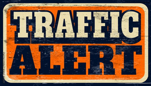 Aged retro traffic alert sign on wood