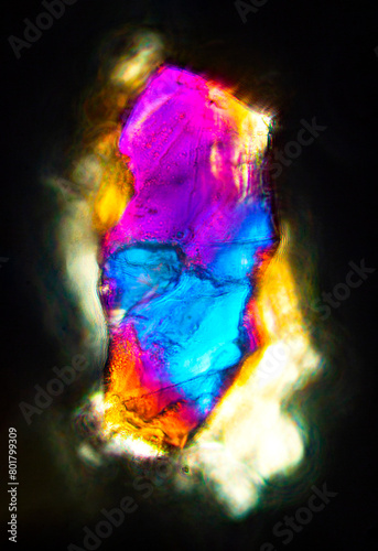 Polarizing micrograph of a California sand grain is abstract art.