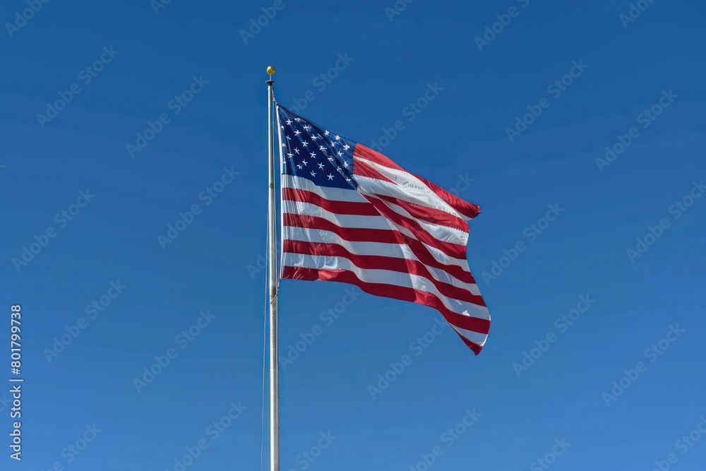 american flag blowing in the wind