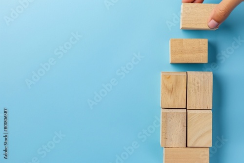 Business growth success achievement concept, arranging wooden block stacking as step stair or ladder for planning development leadership and customer target group concept photo