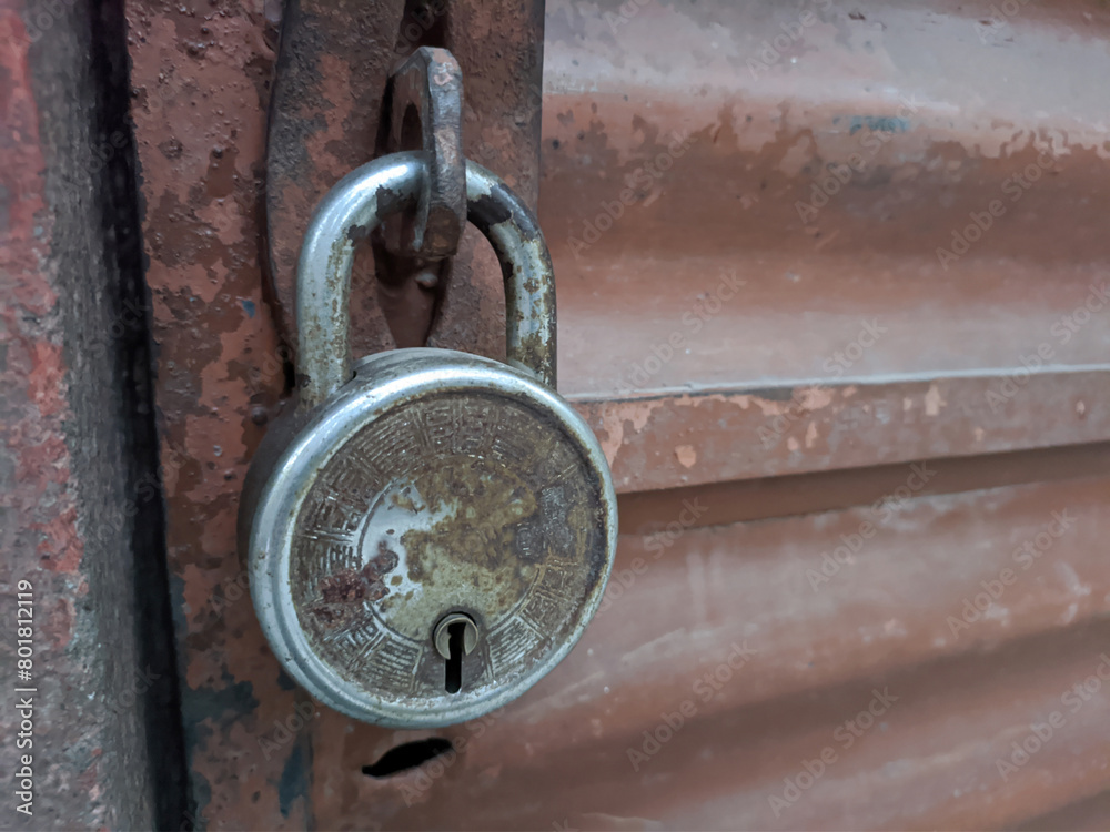 very old metal lock on a door dirty damaged texture very old metal lock on a door dirty damaged texture