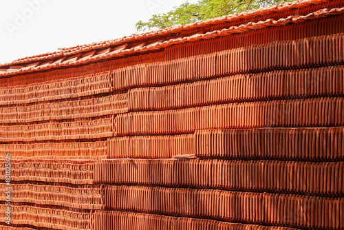 Bild auf Leinwand Red clay roof tiles for vintage looking house made of natural eco friendly building material