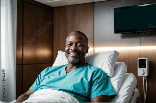 Male senior patient lying smile in hospital bed