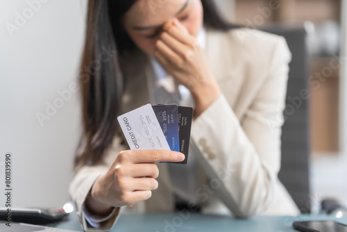 Experienced Asian businesswoman adept at managing stress and financial challenges. Specializes in credit management, bankruptcy, and navigating credit bureaus for optimal financial health. photo