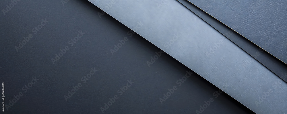 Grey paper minimalistic presentation background. Top view, flat lay with copy space for text Grey paper minimalistic presentation background. Top view, flat lay with copy space for text