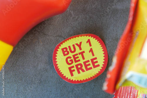 buy 1 get 1 free offer sticker and prodcuts on table  © Towfiqu Barbhuiya 