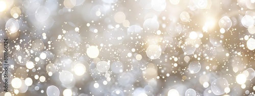 A soft white bokeh background with sparkling lights