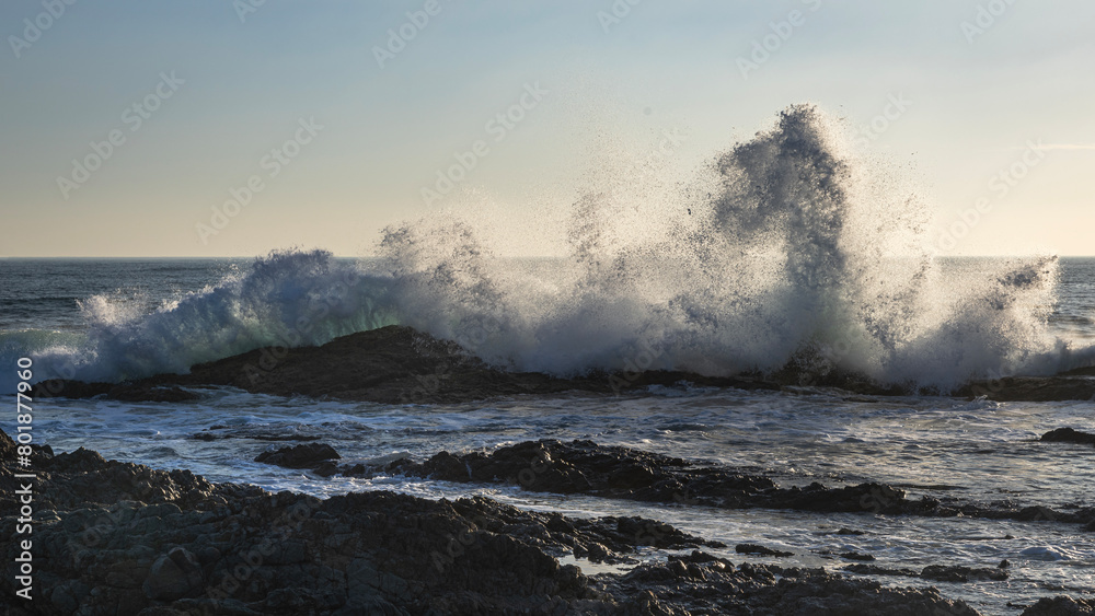 waves crashing onto rocks at minnie water durinng sunrise waves crashing onto rocks at minnie water durinng sunrise
