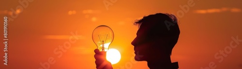 Silhouette of a person turning off lights, emphasizing energy conservation, perfect for ecofriendly or energysaving campaigns photo