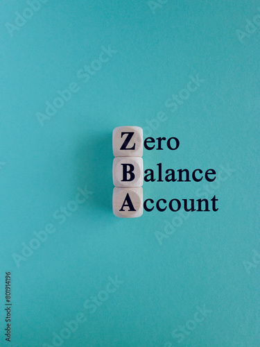 ZBA zero balance account symbol. Concept words ZBA zero balance account on beautiful wooden cubes. Beautiful blue background. Business ZBA zero balance account concept.