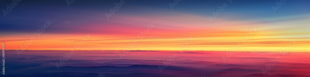 Witness the splendor of a sunrise gradient, where the colors of the dawn blend together in a harmonious display, creating a mesmerizing backdrop for creative endeavors.