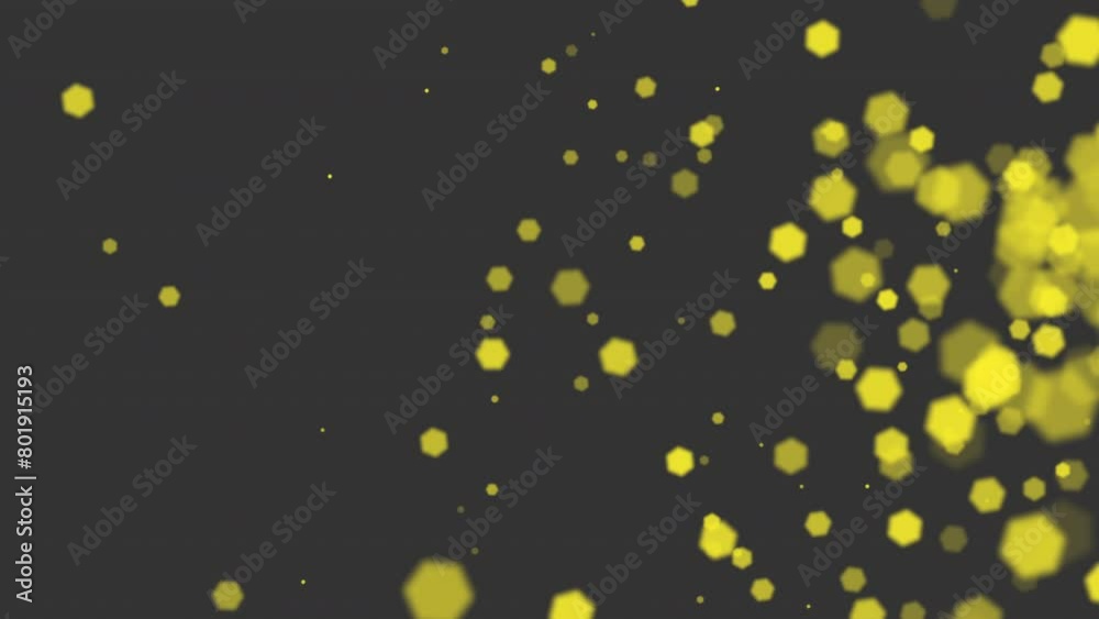 A captivating image with a dark background and numerous yellow stars of varying sizes dispersed in a seemingly random pattern, creating a visually striking and dynamic scene