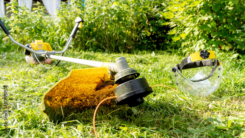 Lawn mower with grass trimmer