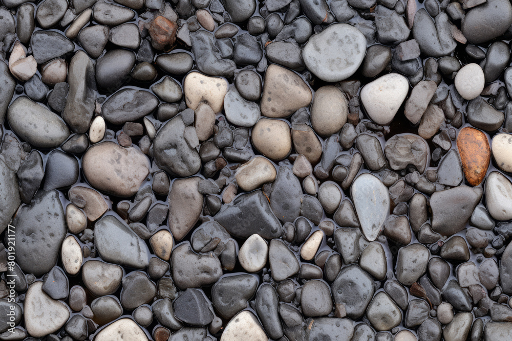 Processed collage of wet pebble stones on asphalt texture. Background for banner, backdrop Processed collage of wet pebble stones on asphalt texture. Background for banner, backdrop